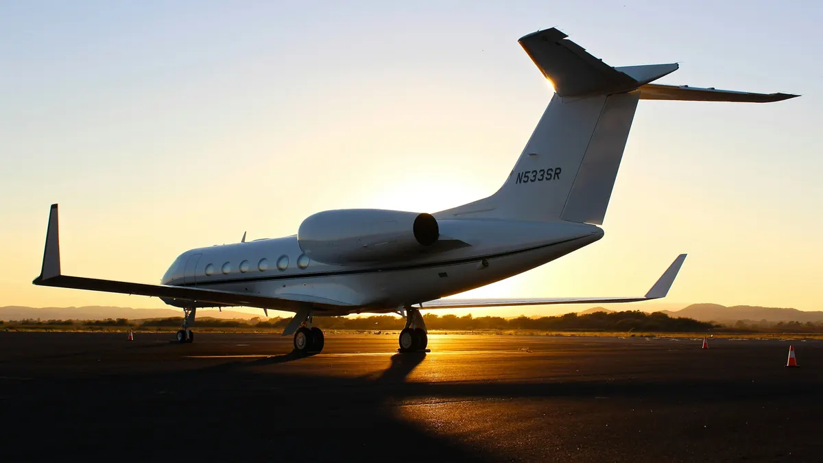 Gulfstream jet on the ramp at sunset